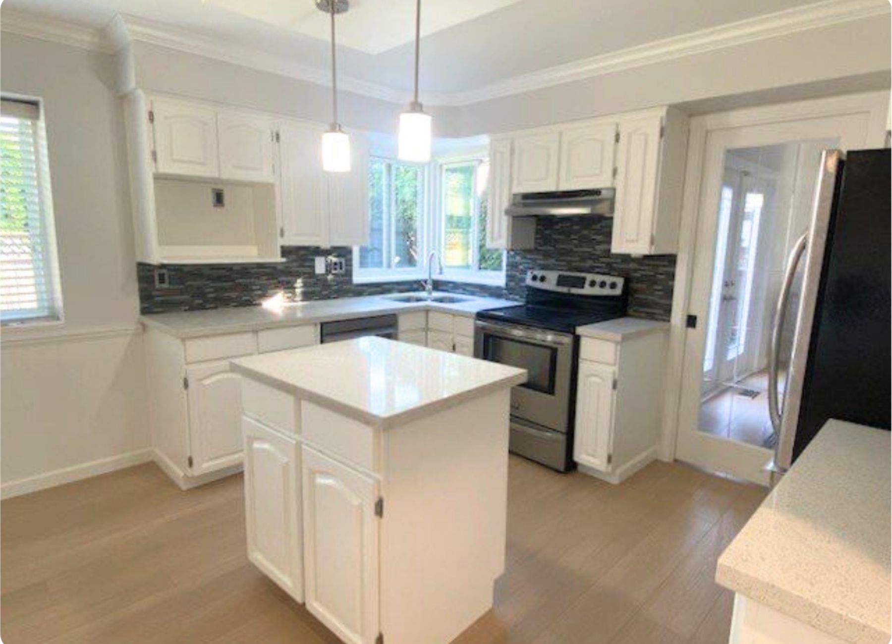 white cabinets repaint after 2 white cabinets repaint after